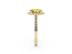 Fancy Yellow Oval Cut Diamond Halo Pavé Engagement Ring Set in Yellow gold with Prong Setting