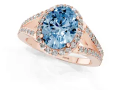 Fancy Blue Oval Cut Diamond Halo Split Shank Pavé Ring Set in Rose gold with Prong Setting