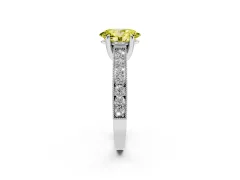 Fancy Yellow Oval Cut Diamond Solitaire Ring Set in White gold with Milgrain-Edged Pavé Band and Prong Setting