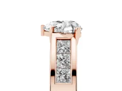 Heart Cut Diamond Solitaire Ring Set in Rose gold with Channel-Set Accent Stones and Prong Setting