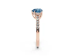 Fancy Blue Heart Cut Diamond Solitaire Engagement Ring Set in Rose gold with Pavé Band and Prong Setting