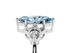 Fancy Blue Marquise Cut Diamond Solitaire Ring Set in Platinum with Cluster Accents on Each Side