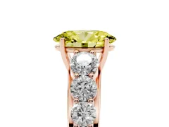 Fancy Yellow Oval Cut Diamond Solitaire Ring Set in Rose gold with Pavé-Set Band and Prong Setting