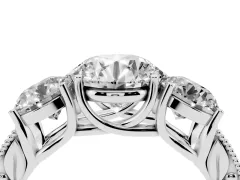 Round Cut Diamond Three-Stone Engagement Ring Set in Silver with Milgrain Pavé Band