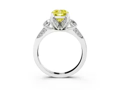 Fancy Yellow Cushion Cut Diamond Three-Stone Ring Set in Platinum with Pavé Band and Smaller Side Stones