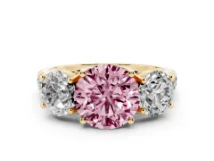 Fancy Pink Round Cut Diamond Three-Stone Ring Set in Yellow gold with Pavé Band