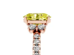 Fancy Yellow Oval Cut Diamond Three-Stone Pavé Ring Set in Rose gold with Prong Setting