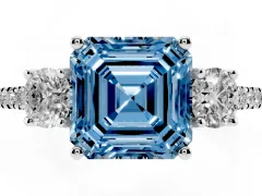 Fancy Blue Asscher Cut Diamond Three-Stone Ring Set in Platinum with Pavé Band and Graduated Sides