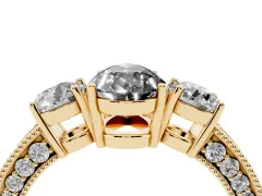 Fancy Black Pear Cut Diamond Three-Stone Ring Set in Yellow gold with Round Side Stones and Pavé Band