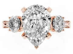Pear Cut Diamond Three-Stone Ring Set in Rose gold with Pavé Band and Smaller Side Stones