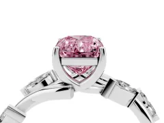 Fancy Pink Radiant Cut Diamond Solitaire Ring Set in Platinum with Twisted Marquise Accent Band