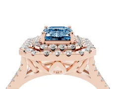 Fancy Blue Emerald Cut Diamond Double Halo Ring Set in Rose gold with Pavé Split Shank and Prong Setting