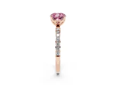Fancy Pink Cushion Cut Diamond Solitaire Engagement Ring Set in Rose gold with Round Pavé Band and Prong Setting
