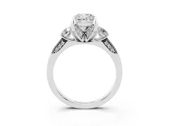 Cushion Cut Diamond Three-Stone Ring Set in Platinum with Pavé Band and Smaller Side Stones