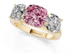 Fancy Pink Cushion Cut Diamond Three-Stone Ring Set in Yellow gold with Plain Polished Band