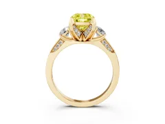 Fancy Yellow Cushion Cut Diamond Three-Stone Ring Set in Yellow gold with Pavé Band and Smaller Side Stones