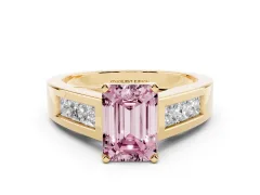 Fancy Pink Emerald Cut Diamond Solitaire Ring Set in Yellow gold with Channel-Set Accent Stones and Prong Setting