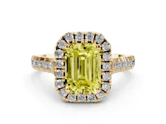 Fancy Yellow Emerald Cut Diamond Halo Engagement Ring Set in Yellow gold with Pavé Band and Prong-Set Center