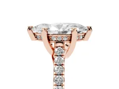 Marquise Cut Diamond Solitaire Ring Set in Rose gold with Brilliant Pavé Band and Prong Setting