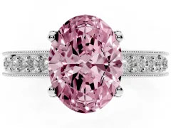 Fancy Pink Oval Cut Diamond Solitaire Ring Set in Platinum with Milgrain-Edged Pavé Band and Prong Setting