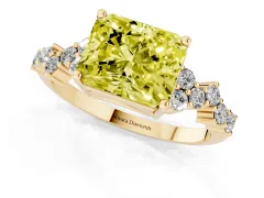 Fancy Yellow Radiant Cut Diamond Ring Set in Yellow gold with Scattered Round Accents