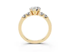 Heart Cut Diamond Five-Stone Prong Set Engagement Ring Set in Yellow gold with Channel Band