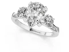 Pear Cut Diamond Three-Stone Ring Set in White gold with Pavé Band and Smaller Side Stones