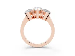 Pear Cut Diamond Three-Stone Ring Set in Rose gold with Channel-Set Band and Prong Settings