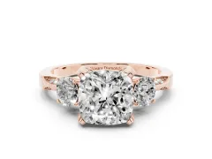 Cushion Cut Diamond Three-Stone Ring Set in Rose gold with Pavé Band and Smaller Side Stones