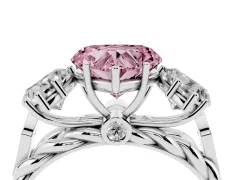 Fancy Pink Heart Cut Diamond Three-Stone Ring Set in Platinum with Braided Band