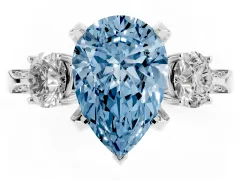 Fancy Blue Pear Cut Diamond Three-Stone Ring Set in White gold with Pavé Band and Smaller Side Stones