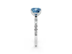 Fancy Blue Princess Cut Diamond Solitaire Engagement Ring Set in White gold with Round Pavé Band and Prong Setting