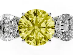 Fancy Yellow Round Cut Diamond Three-Stone Ring Set in White gold with Textured Band