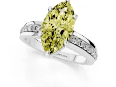 Fancy Yellow Marquise Cut Diamond Solitaire Ring Set in White gold with Channel Set Band and Prong Setting