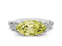 Fancy Yellow Marquise Cut Diamond Ring Set in White gold with Scattered Round Accents
