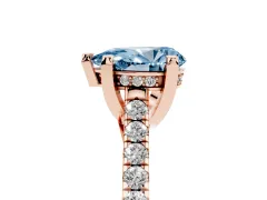 Fancy Blue Pear Cut Diamond Solitaire Ring Set in Rose gold with Brilliant Pavé Band and Prong Setting