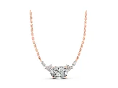Oval Diamond Pendant Set in Rose gold with Heart Accents and Prong Setting