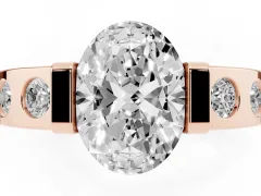 Oval Cut Diamond Channel-Set Band Ring Set in Rose gold with Bezel Prong Setting
