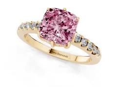 Fancy Pink Cushion Cut Diamond Solitaire Engagement Ring Set in Yellow gold with Pavé Band and Prong Setting