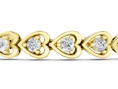 Heart Shape Diamond Tennis Bracelet Set in Yellow gold with Channel and Four-Prong Setting