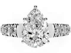Pear Cut Diamond Solitaire Ring Set in White gold with Cut-Down Micro Pavé Band and Prong Setting