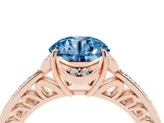 Fancy Blue Round Cut Diamond Halo Ring Set in Rose gold with Channel Set Band and Prong Setting