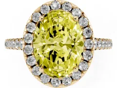 Fancy Yellow Oval Cut Diamond Pavé Halo Engagement Ring Set in Yellow gold with Pavé Band and Prong Setting