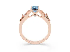 Fancy Blue Emerald Cut Diamond Solitaire Ring Set in Rose gold with Leaf Motif Band