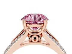 Fancy Pink Round Cut Diamond Split Shank Pavé Engagement Ring Set in Rose gold with Prong-Set Center Stone
