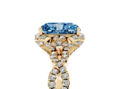 Fancy Blue Radiant Cut Diamond Halo Twist Band Solitaire Ring Set in Yellow gold with Prong-Set Center Stone