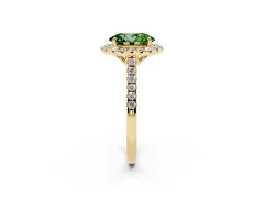 Fancy Green Oval Cut Diamond Pavé Halo Engagement Ring Set in Yellow gold with Pavé Band and Prong Setting