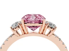 Fancy Pink Cushion Cut Diamond Three-Stone Ring Set in Rose gold with Pavé Band and Graduated Sides