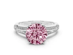 Fancy Pink Round Cut Diamond Split Shank Pavé Engagement Ring Set in White gold with Prong-Set Center Stone