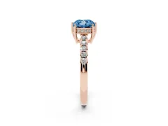 Fancy Blue Cushion Cut Diamond Solitaire Engagement Ring Set in Rose gold with Pavé Band and Prong Setting